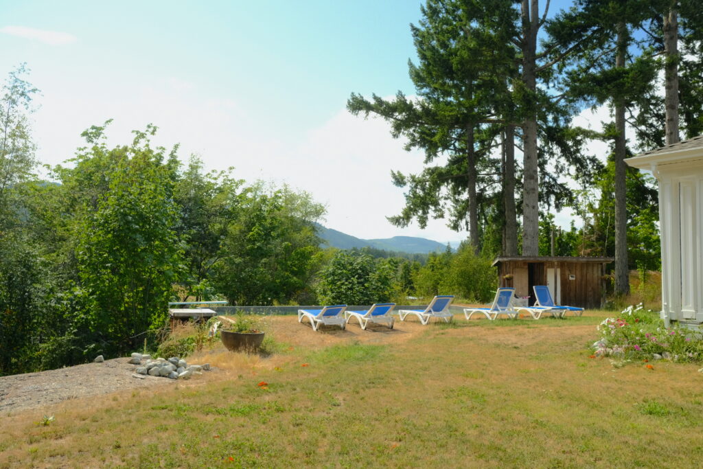 Pool in Sun with spaces to lay on