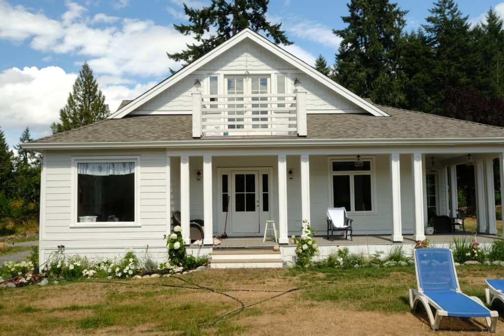 Front view white house with porch